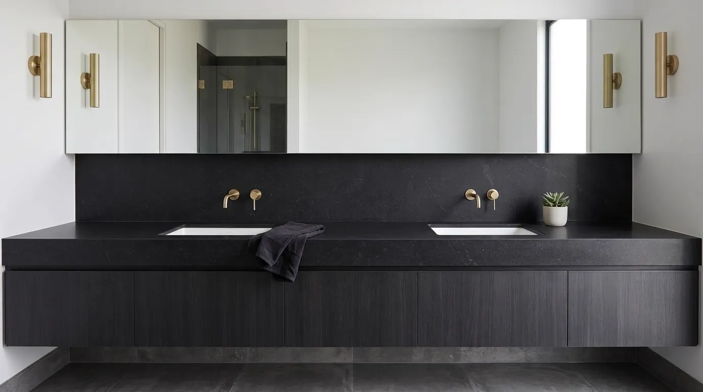 Black Mist double vanity countertop and backsplash in a modern bathroom
