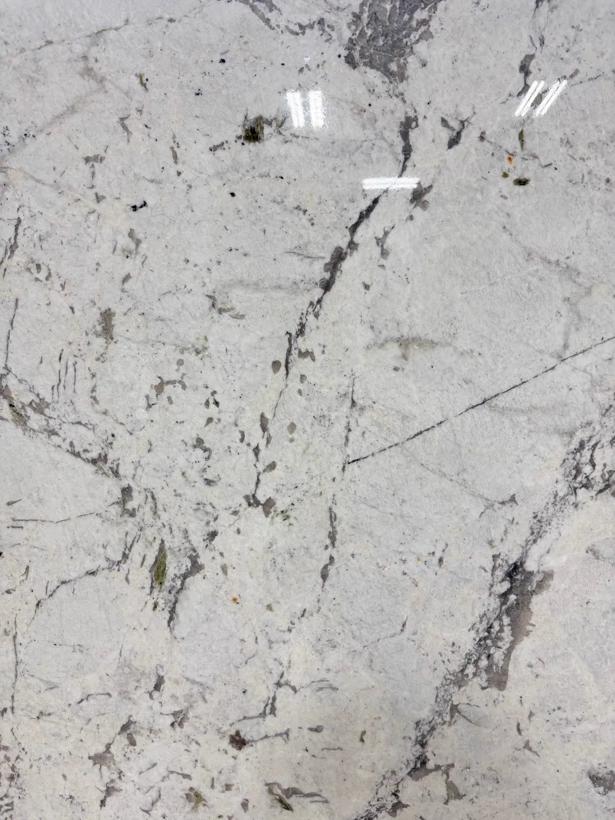 Monalisa Polished Marble slab, white marble with polished finish, close surface and finish detail, West Allis, WI near Milwaukee