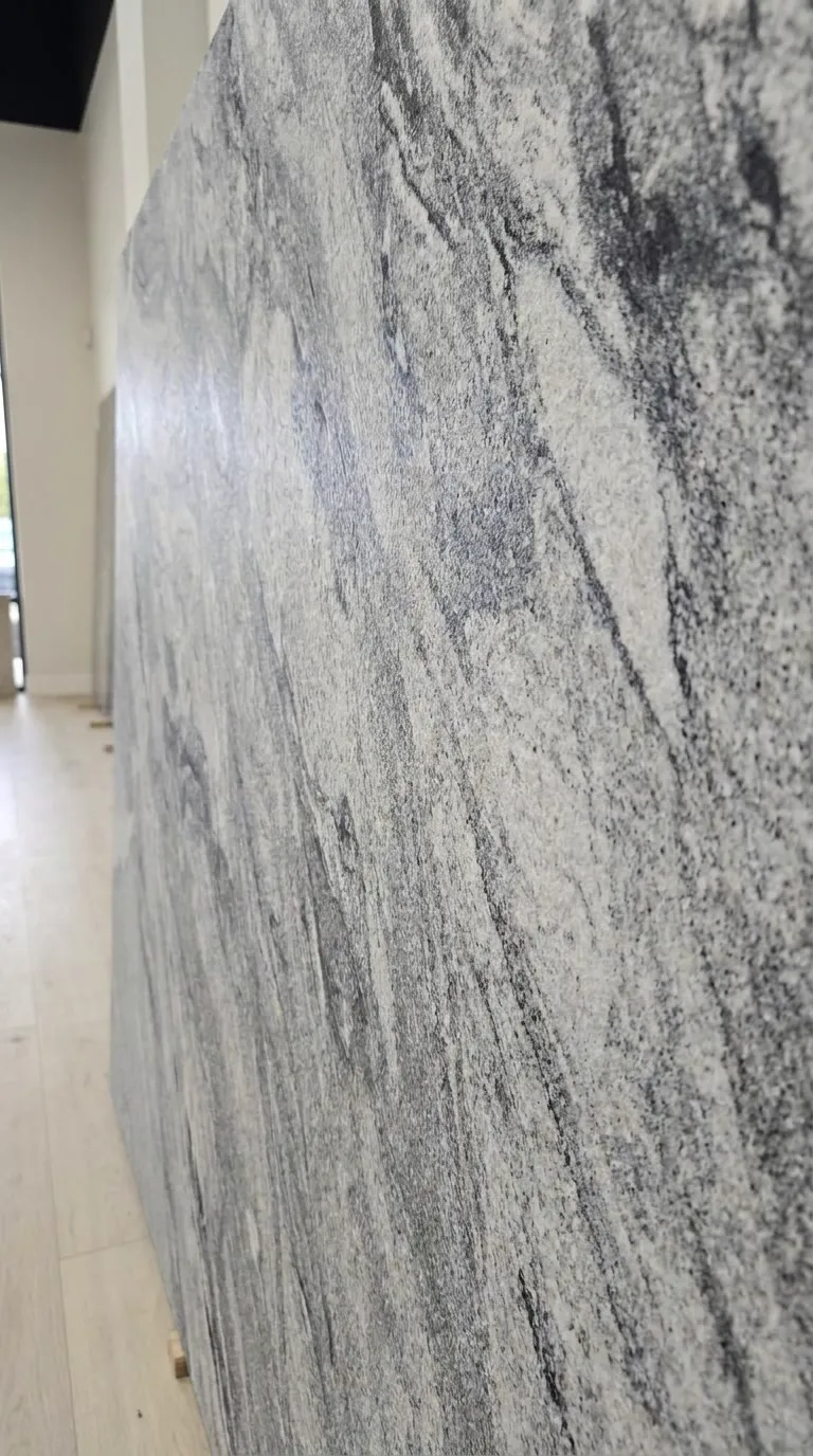Viscon White Leathered granite slab — The surface up close - pattern, grain and finish | StoneX USA, West Allis WI