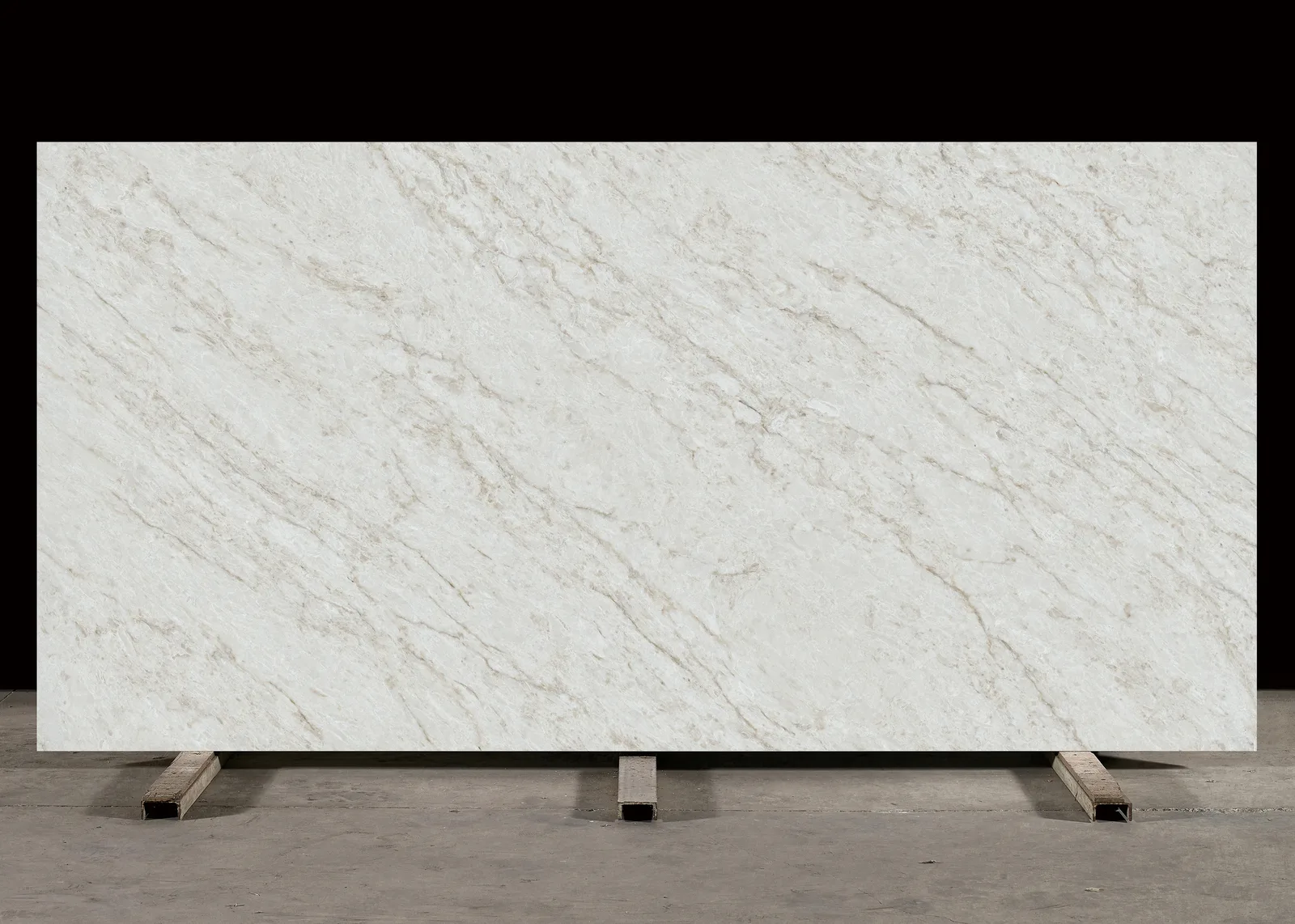 Taj Elysian Leathered Quartz slab pattern, white quartz shown in the polished finish, full slab at StoneX USA, West Allis, WI near Milwaukee