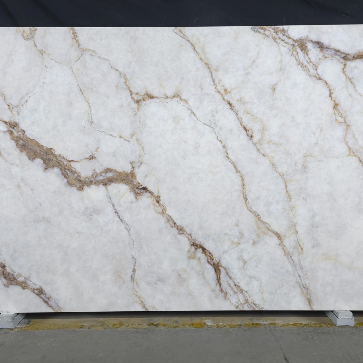 Calacatta Viola HD Quartz Stone engineered quartz slab, full slab on the rack at StoneX USA, West Allis WI