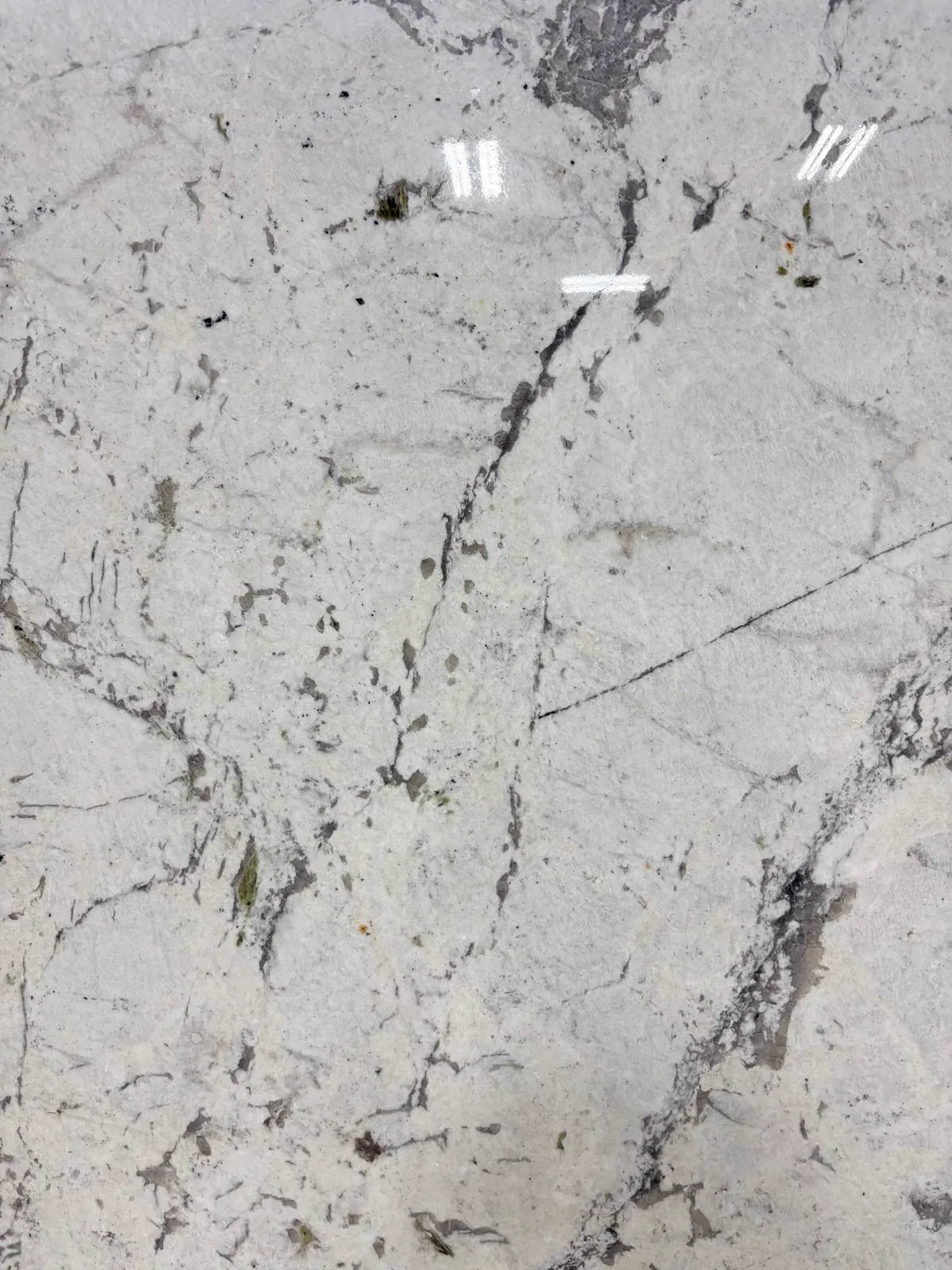 Monalisa Polished Marble slab, white marble with polished finish, close surface and finish detail, West Allis, WI near Milwaukee