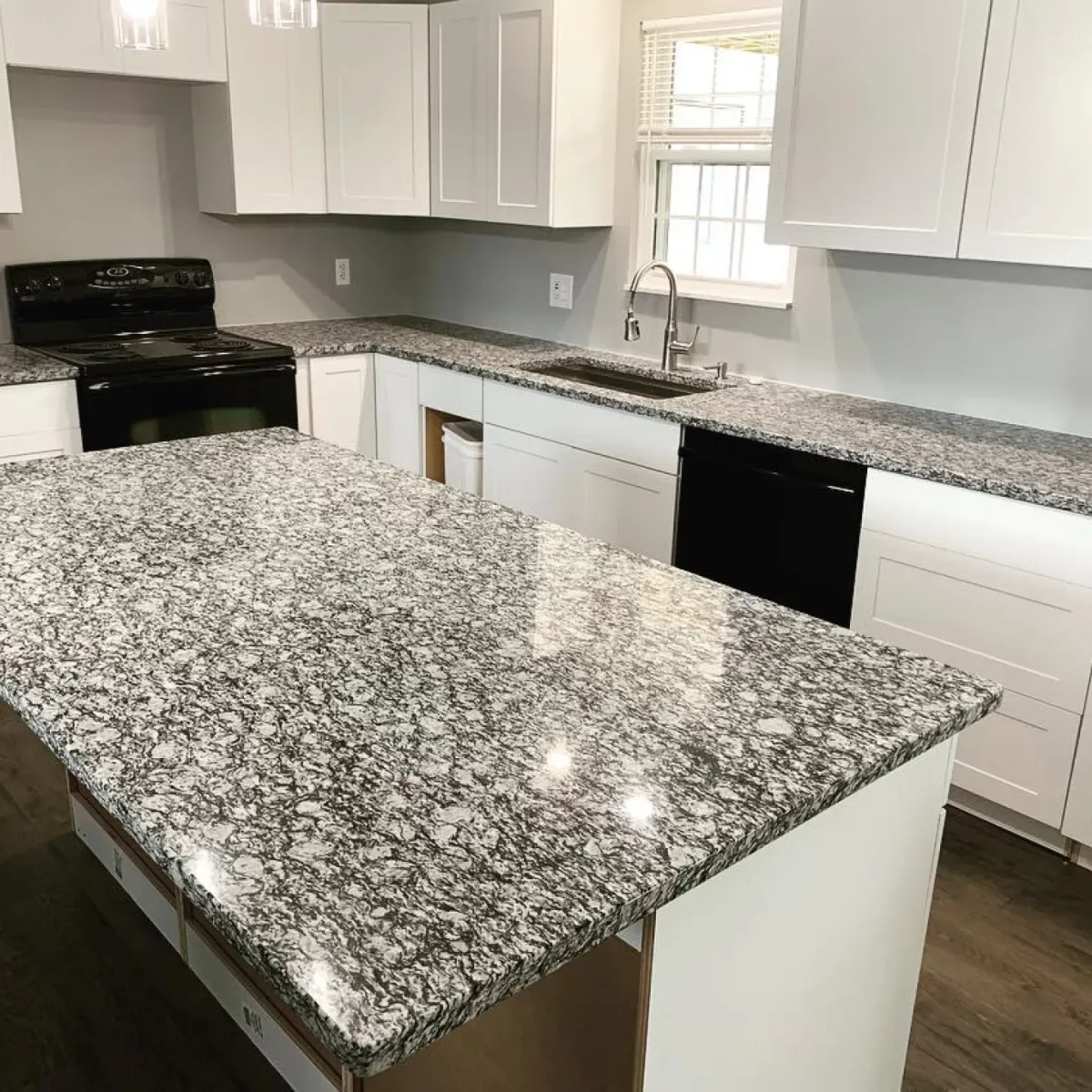 White Sparkle granite slab with polished finish, veining detail, StoneX USA slab gallery near Milwaukee