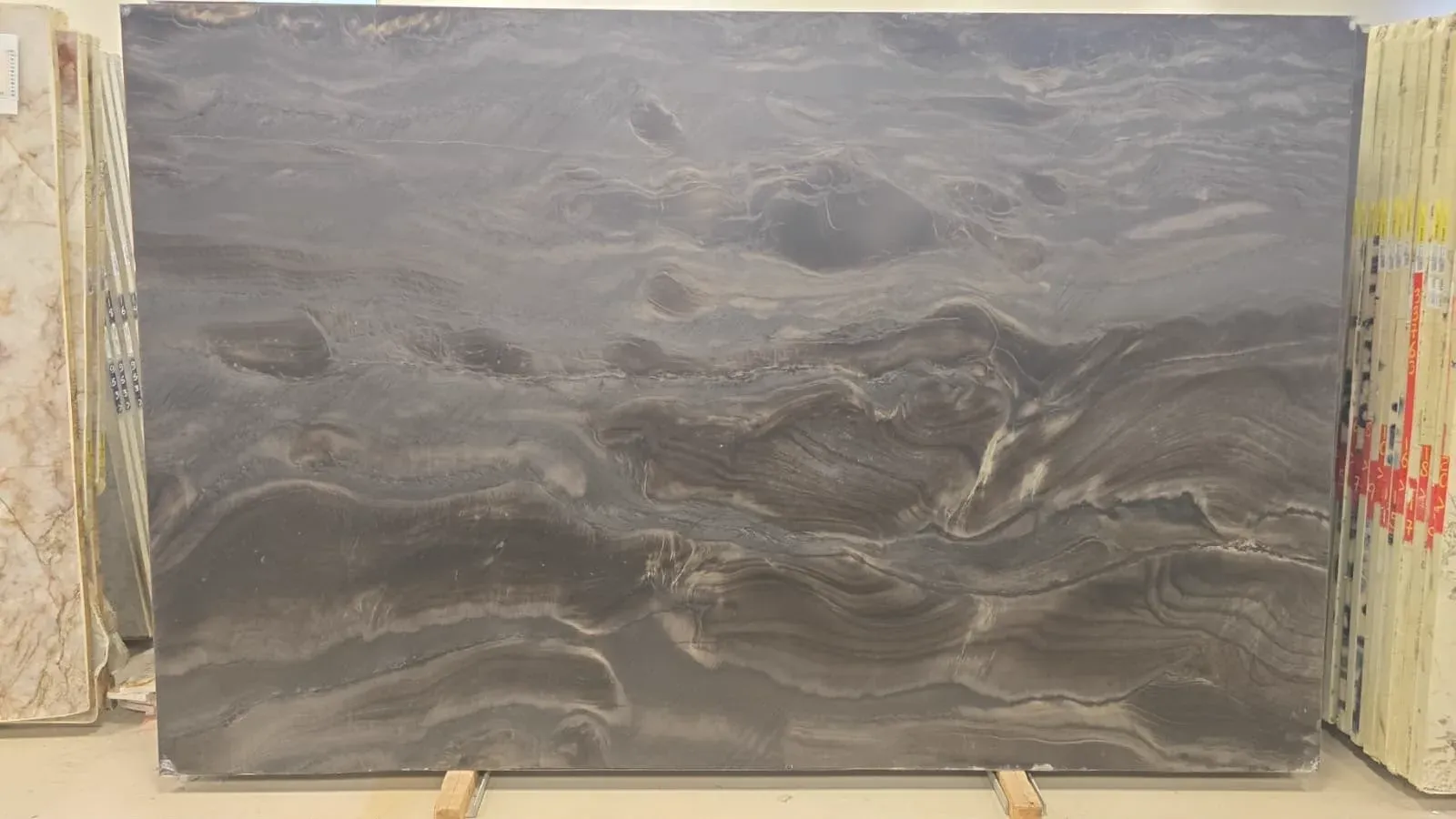 Black Phantus Leathered Quartzite slab, black quartzite with leather finish, close surface and finish detail, West Allis, WI near Milwaukee